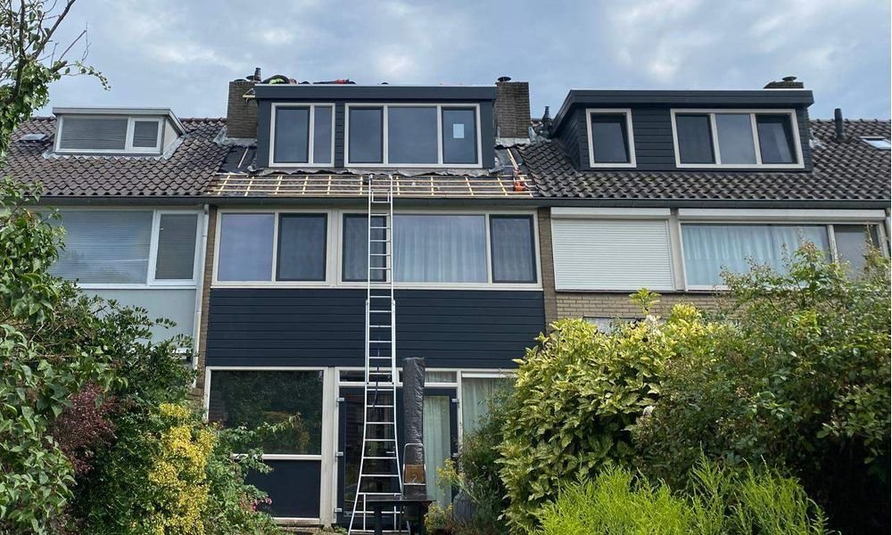 Wat kost een plat dak herstellen in Druten?